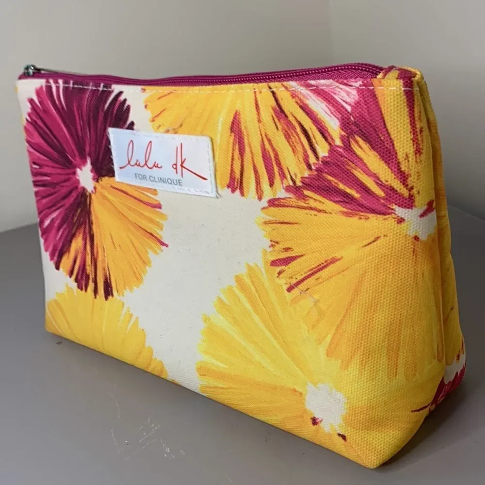 EUC Clinique LaLa DK makeup bag